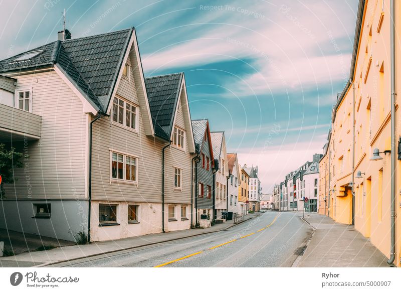 Alesund, Norway. Old Wooden Houses In Cloudy Summer Day Centre alesund architecture beautiful building europe house nobody norway norwegian old old town outdoor