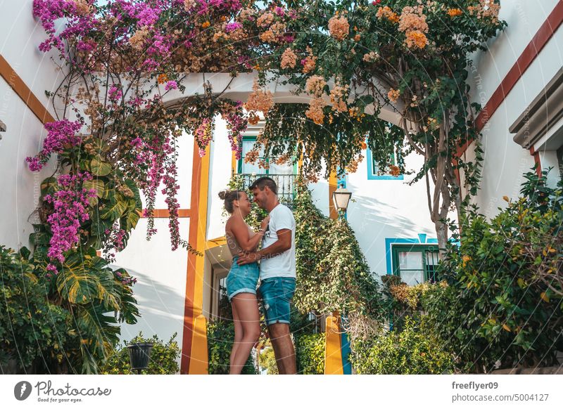 Couple on their honeymoon on a pintoresque village from Gran Canaria couple love young tourists spain canary attractive city urban visit historic old small cosy
