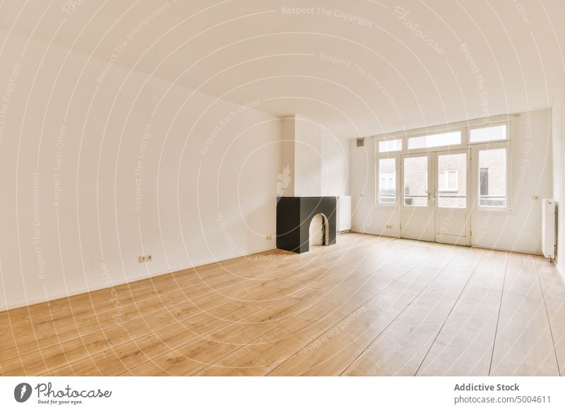 Empty room of a modern flat apartment indoor interior floor parquet empty home new house wall contemporary estate property residential window light white design
