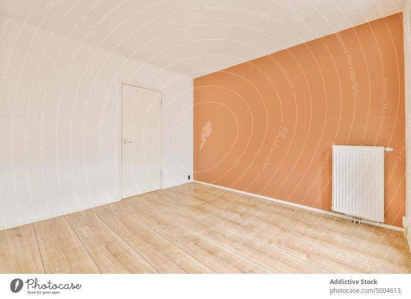 Empty room of a modern flat apartment indoor interior floor parquet empty home new house wall contemporary estate property residential light white design nobody