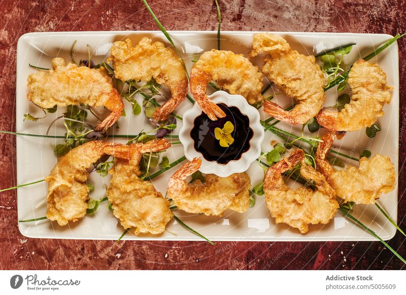 Prawn tempura with soy sauce prawn plate green seafood restaurant shrimp seasoning gourmet serve portion tasty table fresh savory scrumptious lunch delectable