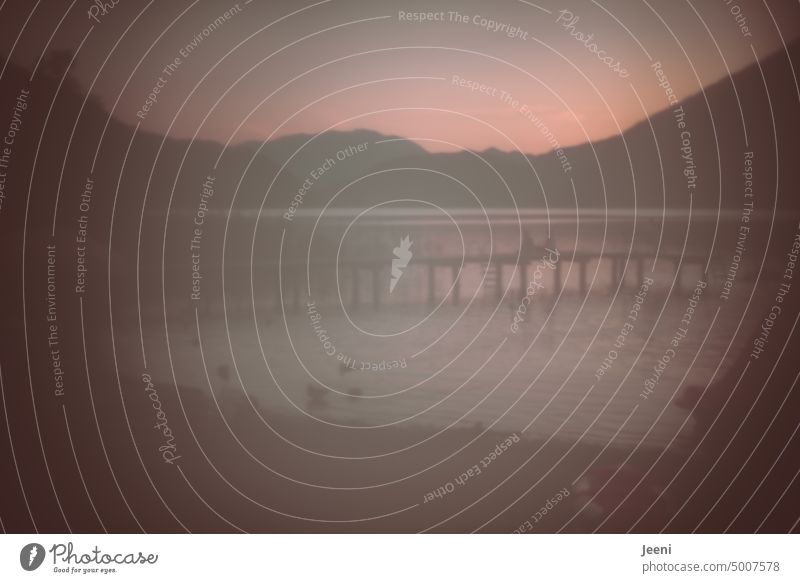 Outlines in the mountains Summer hazy background blurriness Abstract Light blurred Diffuse Lake Mountain Mountain lake Evening Dusk sunset Sky Footbridge Calm