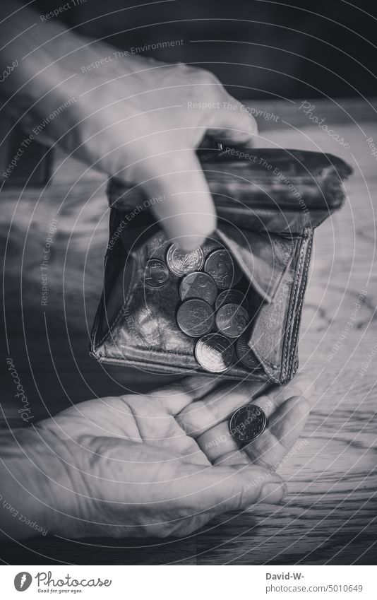 Woman counting her change from her purse small change Money Numbers Purse Poverty inflation Money purse portmonee Wallet hands Euro Coin Little arm Worries