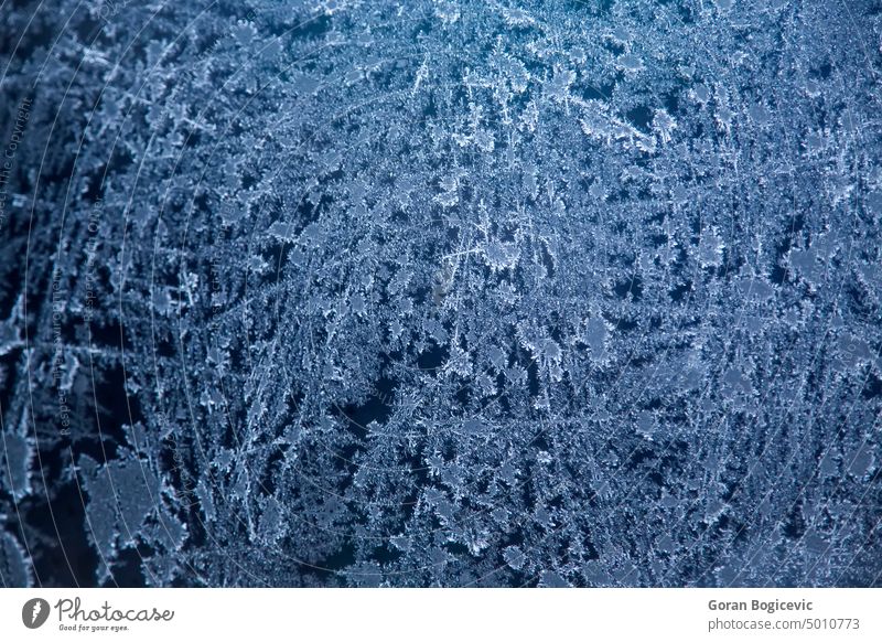 Frozen glass ice frost frozen cold window winter pattern season blue crystal nature natural cool surface icicle seasonal shape close iced weather climate