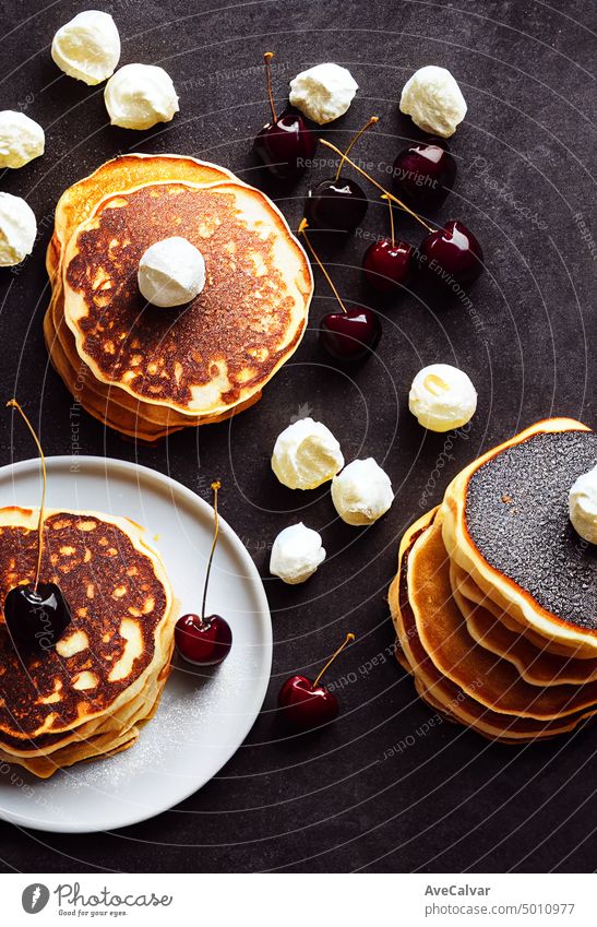 Sweet pancakes with ricotta and cherries. black pancakes. breakfast. top view, copy space stack syrup horizontal photography morning pouring close-up freshness