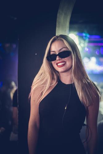 Beautifu blonde model with sunglasses accessories adult attractive background beautiful beauty black caucasian cheerful city clothing cute dress elegant