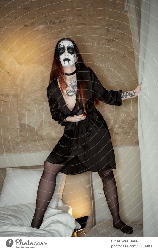 A horrific season of corpse paint, witches, black lips, and messy hotel rooms. A moody Halloween with an inked girl in a black dress. And a bit of a nipple slip.