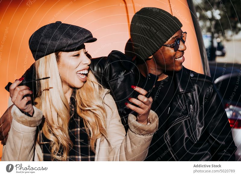 Black man hugging laughing woman with mascara friends street black cheerful makeup young african american ethnicity happy fun urban lifestyle leisure friendship