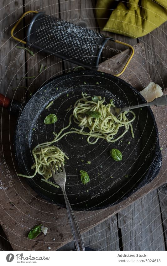 Tasty spaghetti with pesto sauce, spinach and parmesan cheese food spaguetti nutrition vitamin vegetarian eat from above detox freshness natural nobody cooking