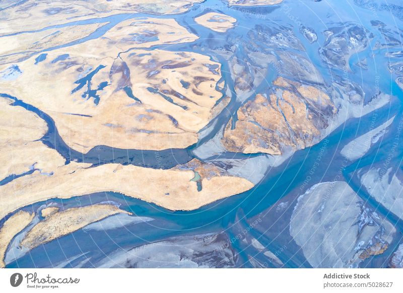 Aerial breathtaking view if river estuary in nature valley wetland countryside landscape water scenic terrain iceland season surface stream flow picturesque