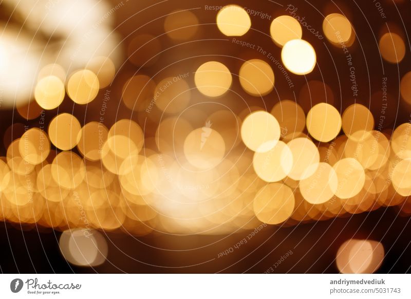 Christmas gold background. Festive abstract background with bokeh defocused lights Decoration Colour Design Yellow Gold Light Glow Public Holiday Glamor