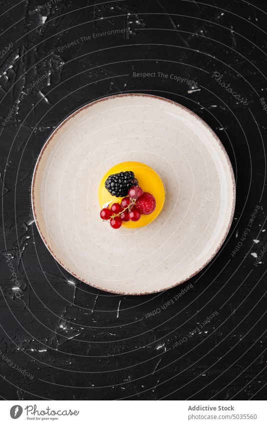 Small cake with berries on plate berry table currant blackberry raspberry dessert sweet serve treat delicious food tasty fresh gourmet pastry yummy portion