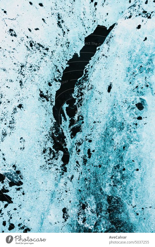 Frozen ice texture background, abstract fluid minimal style wallpaper. Cracks on water. surface icy blue macro cold frost winter cool crystal freeze light white