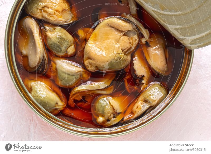 Mussels in a open can with sauce ingredient vinegar packaging appetizer container preserve omega3 processed aluminium tapas preserves escabeche healthy