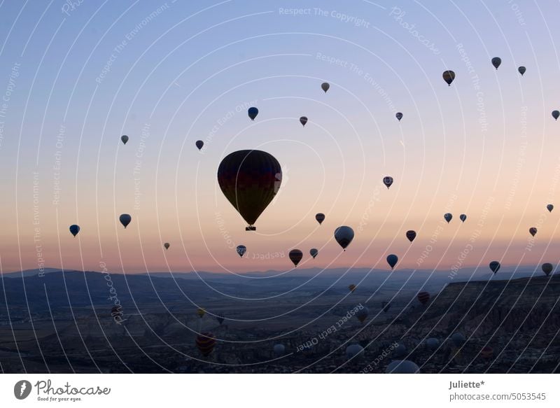 Morning atmosphere in Cappadocia Turkey hot-air balloon morning mood Sky divine Uniqueness Fabulous Dream Moody Memory Skyward Color photo atmospheric sky