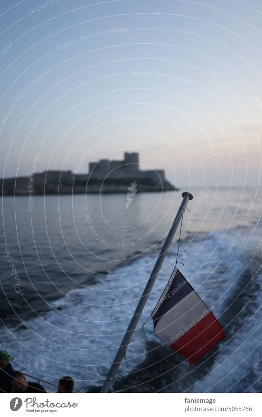 Elle est belle, la France Southern France Château d'If Boating trip Navigation Trip flag Bleu blanc rouge tricolor Mediterranean sea Ocean Night Evening castle