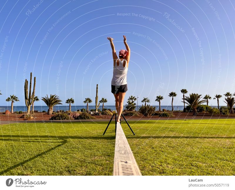 A question of balance Balance Stability move forward Woman slackline Concentrate balancing act Movement Contentment consolidated stable harmony Summer Sky palms
