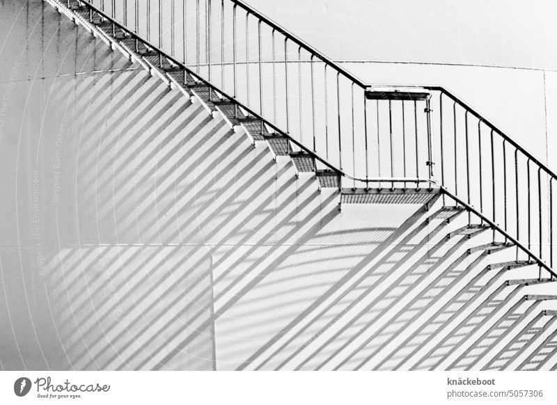 stairs at the silo Stairs rail Architecture Banister Winding staircase Light Shadow Black & white photo Industry Downward Landing Career Deserted
