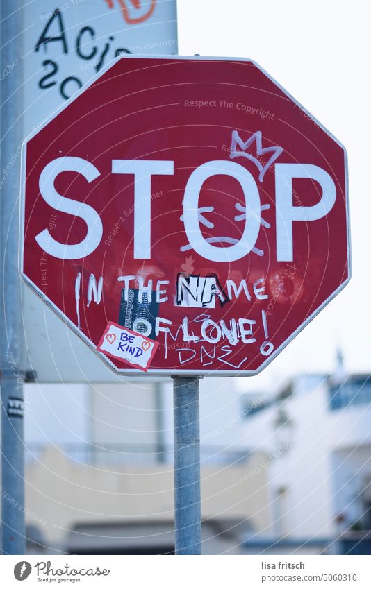 Stop in the name of Love Stop sign Exterior shot Colour photo Road sign Road traffic Signs and labeling Signage War Bans Attachment Solidarity Clue