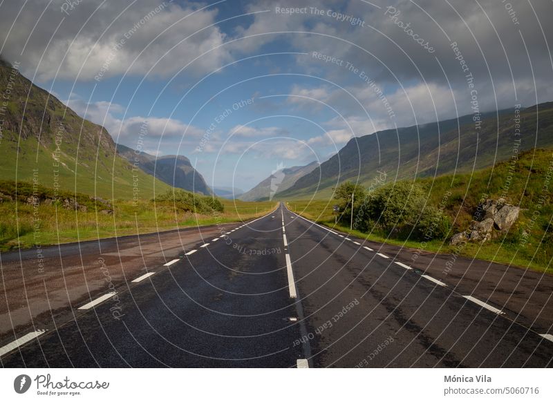 A82 road through Glencoe in the Scottish Highlands a82 highlands scotland mountain valley clouds cloudy green grass grass field nature Scotland Nature Landscape
