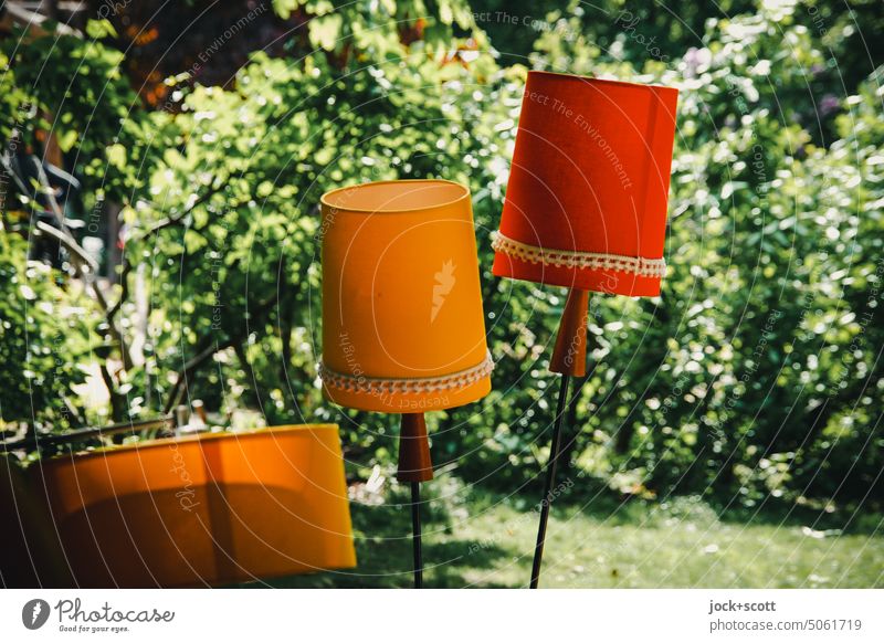 the three lampshades in the green sunlight Lampshade Standard lamp Sunlight Nature bushes Warmth switched off daylight Retro Flea market Shadow obliquely Offer