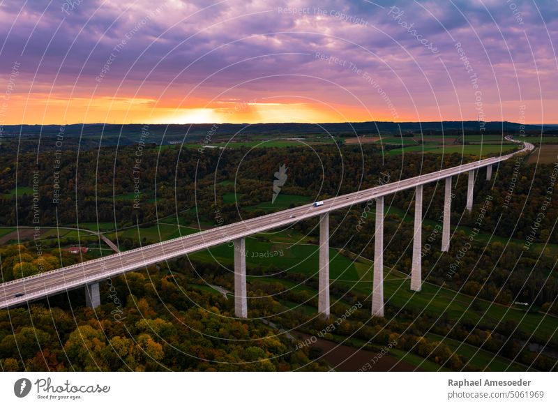 Aerial view of Kochertal Bridge during sunset in autumn aerial aerial view architecture asphalt bridge colorful concrete connection countryside dusk evening
