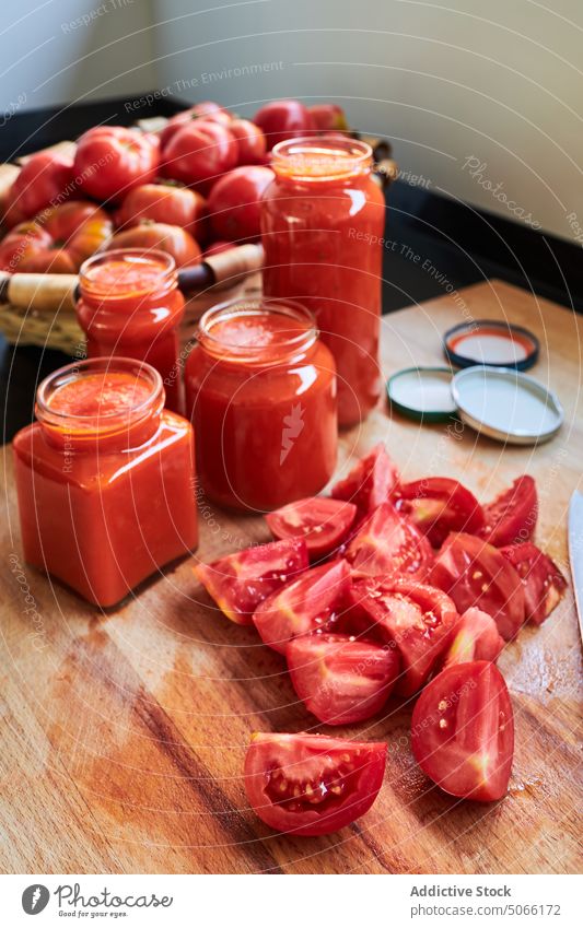 Tomatoes and sauce in jar tomato homemade ingredient table kitchen food vegetable delicious tasty fresh ripe vegan nutrition gourmet vitamin recipe culinary