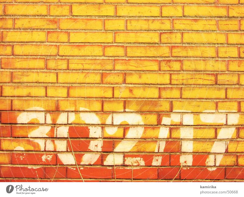 302/17 Wall (building) Wall (barrier) Digits and numbers Brick Red Yellow Abstract Graffiti Bright Sun Shadow