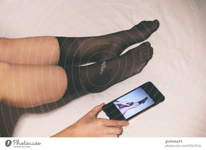 For foot lovers: sexy women feet in black nylon socks live via cell phone portrait Woman Toes Legs Feminine Bed Cellphone Cellphone camera Foot model Nylon