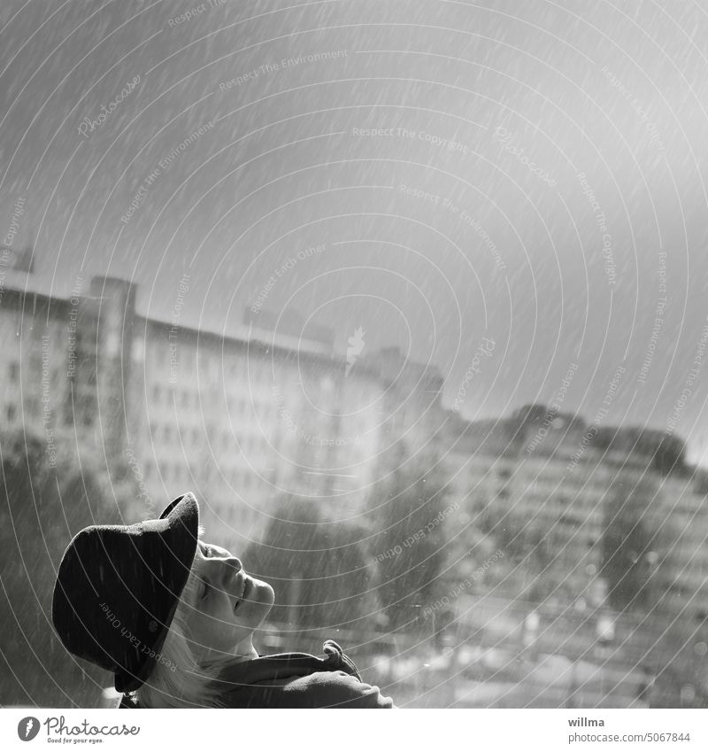 Let life rain down on you ... Rain Woman To enjoy Rainy weather Lifestyle Smiling Happiness Happy Joy feminine youthful Hat stand in the rain young girl person