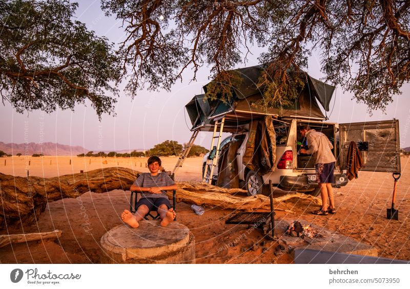 prefer to live unusually | free and wild fortunate Happy Contentment contented Infancy Child camp Camping site Wilderness Family Son campsite Africa Warmth
