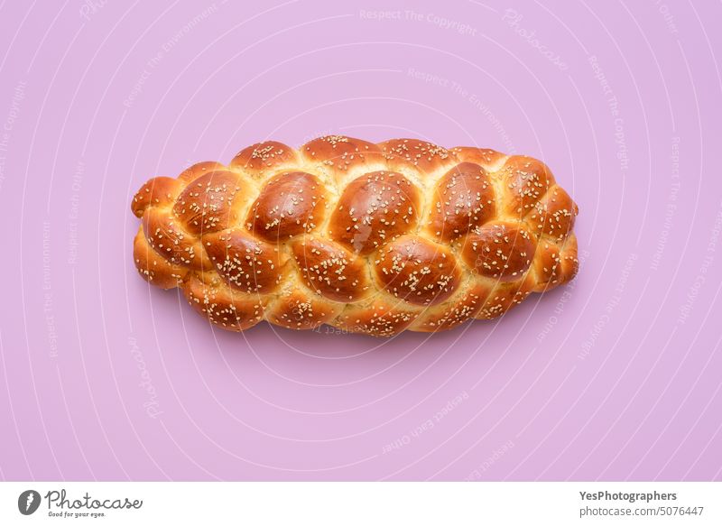 Challah bread above view, isolated on a purple background Sabbath baked bakery braided breakfast bright celebration challa challah close-up color crust cuisine
