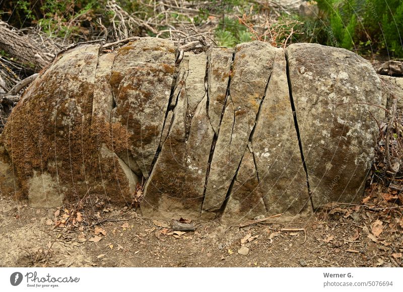 Multiple, naturally split stone as if divided by human hand. Stone Structures and shapes Gray Colour photo Exterior shot Nature