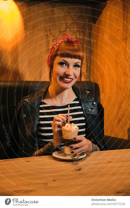 Portrait of a redhead, attractive and smiling woman looking at camera posing with a coffee with cream. advertisement americano beautiful beverage caffeine