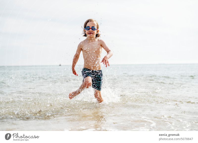 Child bathes in the sea vacation Vacation & Travel Ocean Relaxation Summer Beach Tourism Summer vacation Water Nature Beautiful weather holidays school holidays