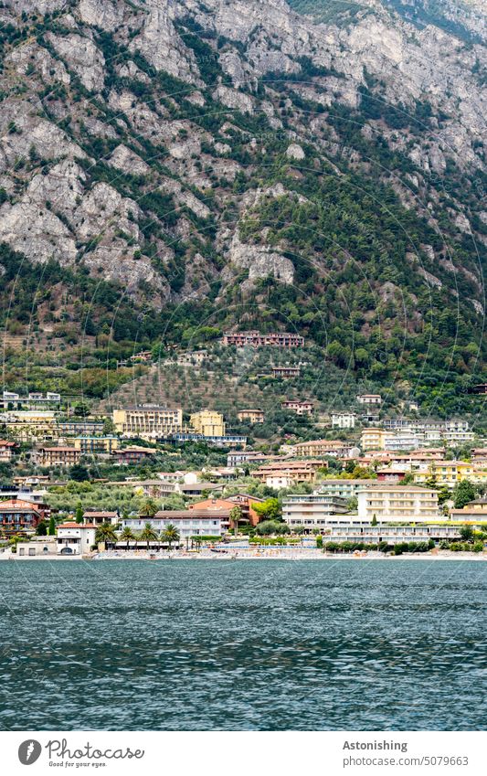 View of Limone sul Garda, Lake Garda, Italy 2 Lemone bank coast mountain Tall height Water Town Steep Large Horizon Clouds Vantage point wave Blue Green Nature