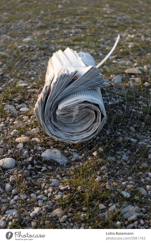 lost newspaper Newspaper newspaper roll Doomed Ground newsprint Newspaper delivery person leftover bequest Exterior shot out Reading message transmission