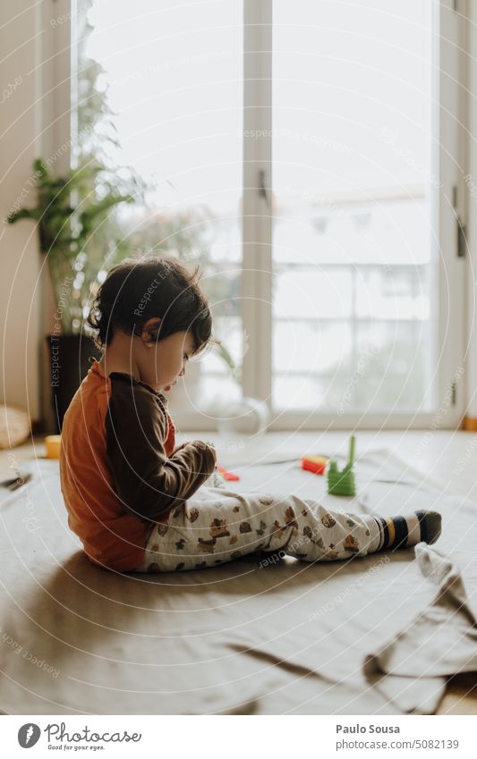 Cute Boy playing on The floor at home Boy (child) Child childhood Authentic Infancy Colour photo Joy Lifestyle 1 - 3 years Day Human being Leisure and hobbies