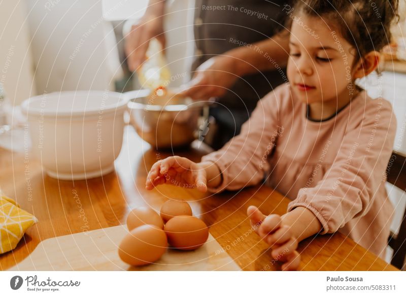 Child picking eggs childhood Egg Cooking Preparation Baked goods home recipe fun cook cooking food Kitchen Authentic Bakery Dough Table Make Flour Baking