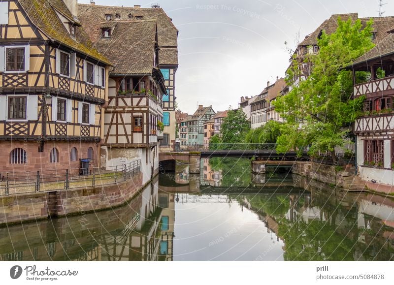 Idyllic waterfront impression in a neighborhood called Petite France in Strasbourg, a city in the Alsace region of France Old town Sick FLUSH SICK River Bridge