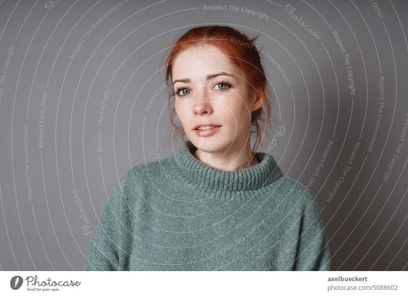 mid adult woman with red hair green eyes and turtleneck sweater portrait real people authentic young lady girl female casual person jumper pullover indoor