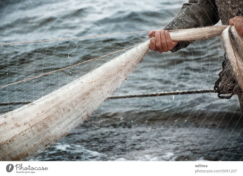 Detail of an old traditional fishing net - a Royalty Free Stock Photo from  Photocase