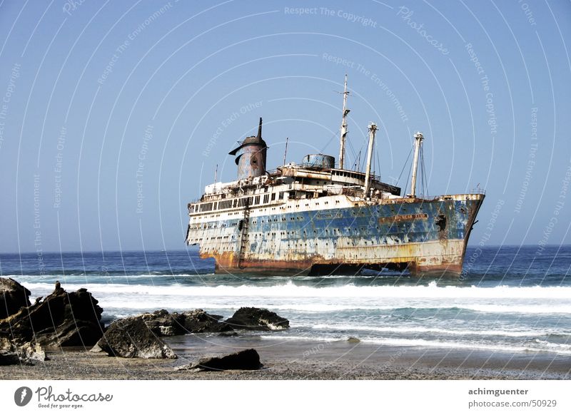 unlucky Fuerteventura Watercraft Waves Ocean Beach Surf Coast Sun American Star Dangerous Sand Stone Rust Threat ghost ship Broken