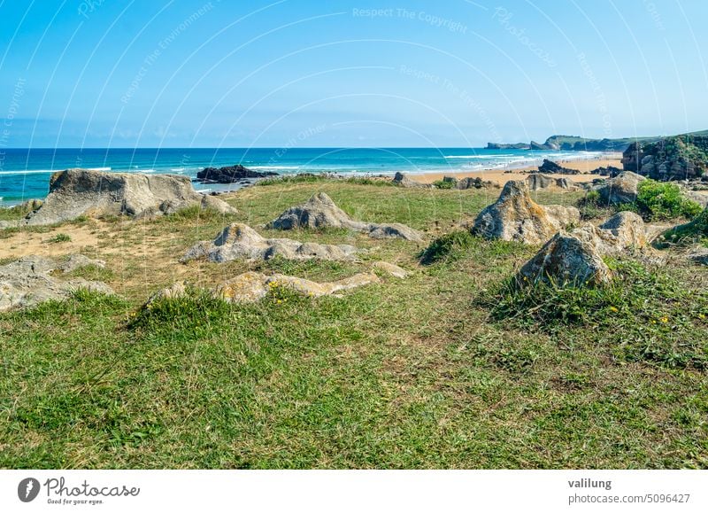 View of the dunes and rocky beach in Cantabria, northern Spain Atlantic Costa Quebrada Europe Liencres Liencres Dunes Natural Park background coast coastline