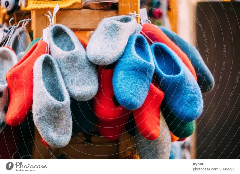 Close View Of Various Colorful European Felt Boots Or Slippers At Winter Christmas Market. Souvenir From Europe showcase estonia close vintage hand made riga