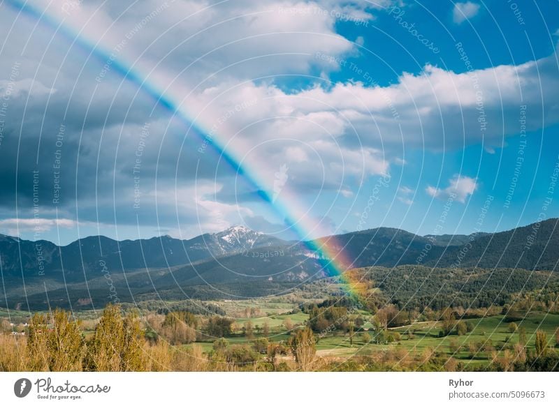 Spain. Panoramic View Of Pyrenees Mountains Landscape With Rainbow Above Forest And Hills. Panorama Spanish Spring Nature travel Catalonia cloudy hill pyrenees