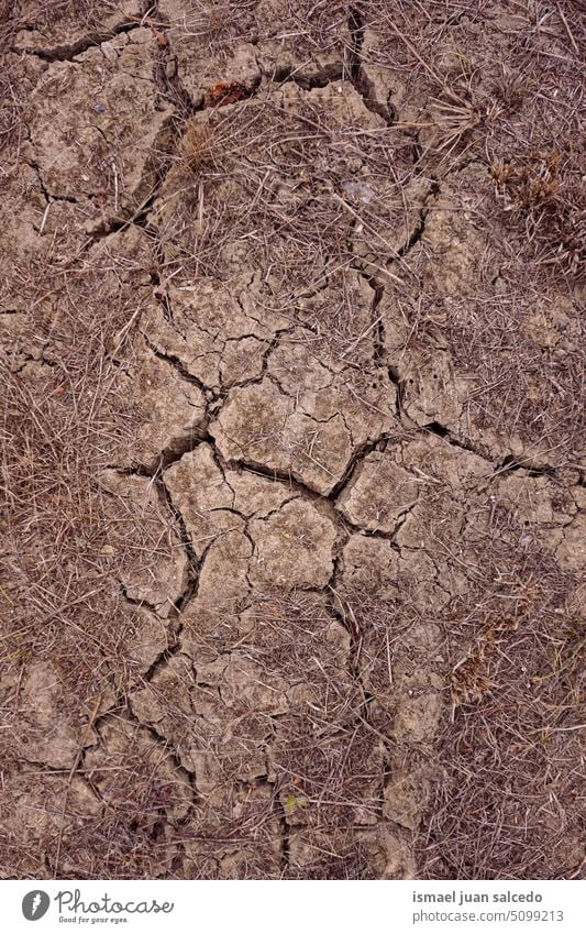 dry ground in the nature, climate change land brown textured earth desert pattern dirt arid sand surface environment global warming abstract background