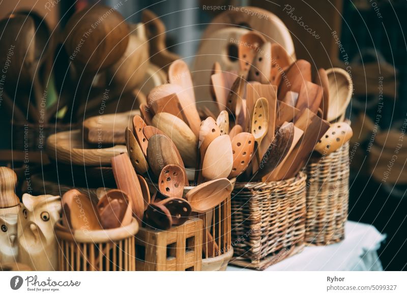 Set Of Handmade Wooden Spoons In European Traditional Market dishware craft market eco traditional wooden set kitchen europe spoon handmade souvenir retro