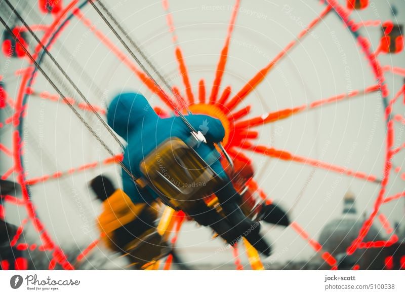 Chain carousel meets Ferris wheel Chairoplane Carousel motion blur Speed Vertigo Christmas Fair Leisure and hobbies Theme-park rides Attraction Rotation Winter