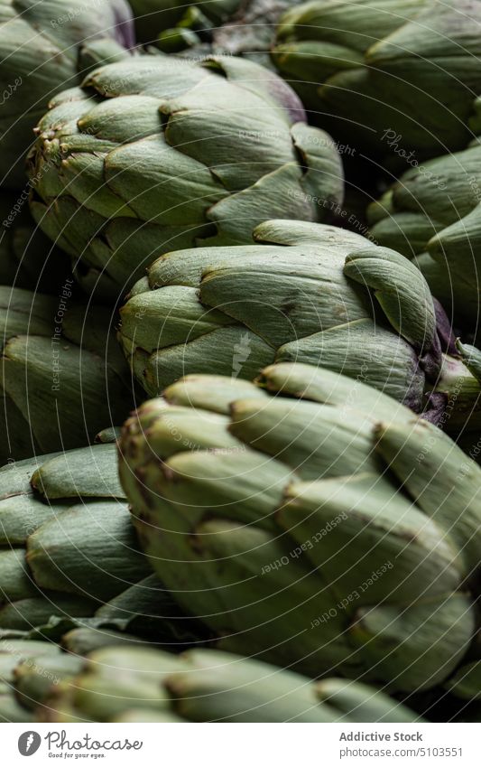 Collection of fresh artichokes in market vegetable background natural assorted appetizing many edible harvest healthy food ripe palatable vitamin diet taste